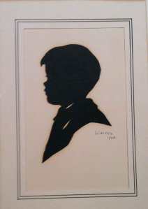 silhouette of boy cut by artist Audrey Waite